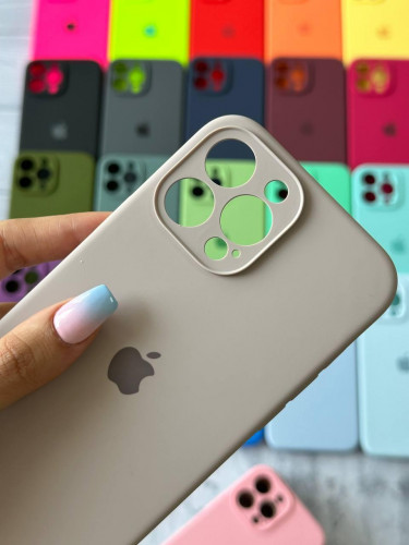 The original silicone case inside the fur of the iPhone 15