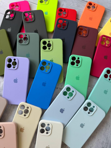 The original silicone case inside the fur of the iPhone 15