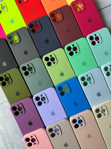 The original silicone case inside the fur of the iPhone 15