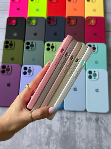 The original silicone case inside the fur of the iPhone 15